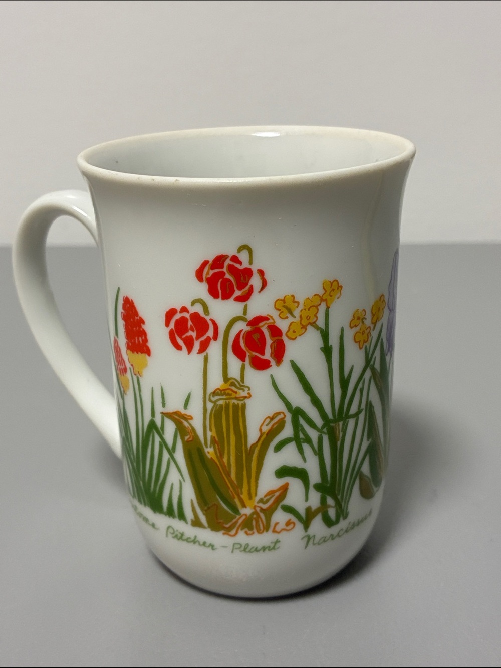 White Floral Stoneware Mug with Red, Purple, Pink, Blue and Yellow Flower Design